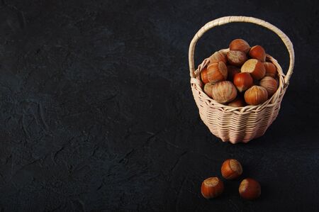 Hazelnuts, filbert on wooden backdrop. heap or stack of hazelnuts. Hazelnut background, healty foodの写真素材