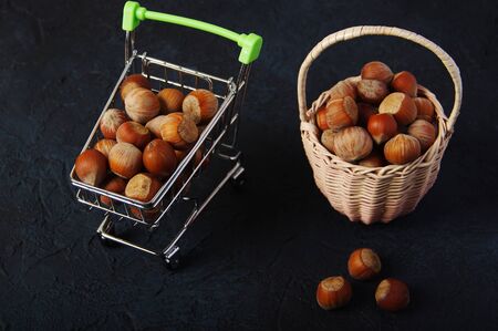 Hazelnuts, filbert on wooden backdrop. heap or stack of hazelnuts. Hazelnut background, healty foodの写真素材