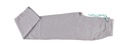 Gray sweatpants with white drawstring. Isolated image on a white background. Nobody.の写真素材