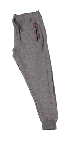 Pants folded in half. Warm gray pants with red zippers. Isolated image on a white background. Nobody.の写真素材