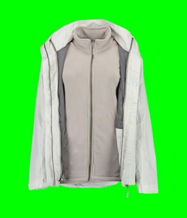 Open white warm jacket. Isolated white women's jacket on a green background. Isolated image on a green background. Nobody.の写真素材