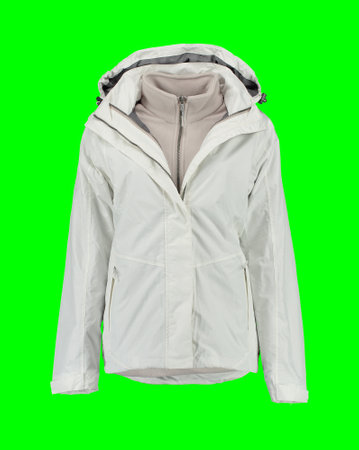 Open white warm jacket. Isolated white women's jacket on a green background. Isolated image on a green background. Nobody.の写真素材