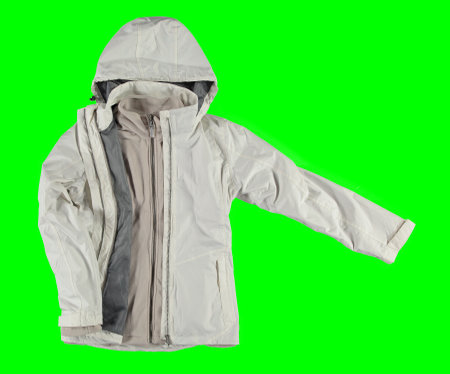 Open white warm jacket. Isolated white jacket on a green background. Isolated image on a green background. Nobody.の写真素材