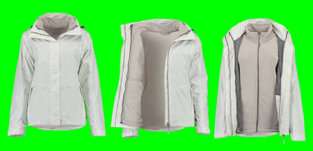 Set white warm jacket. Isolated white women's jacket on a green background. Isolated image on a green background. Nobody.の写真素材