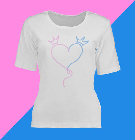 White T-shirt with a heart. Blue and pink background. Clothing for a gender party. Photo on a mannequin.の写真素材