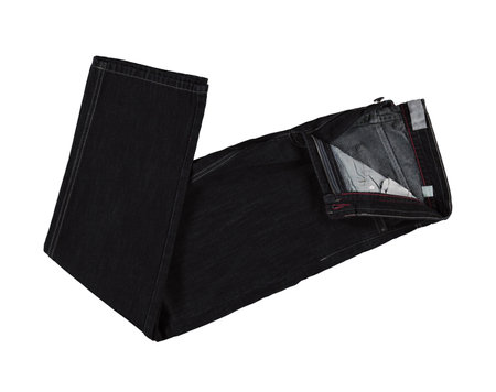 Black folded jeans. Isolated image on a white background.の写真素材