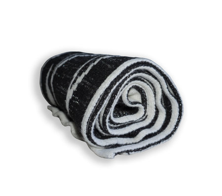 Rolled up black and white scarf. Fabric twisted into a roll. Isolated image on a white background. Rhinestones on fabric.の写真素材
