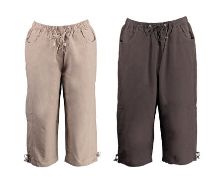 Beige and brown summer capris. Adjustable ties at the sides. Isolated image on a white background. Photo on a mannequin.の写真素材