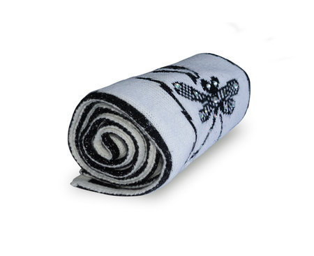 Rolled up black and white scarf. Fabric twisted into a roll. Isolated image on a white background. Rhinestones on fabric.の写真素材