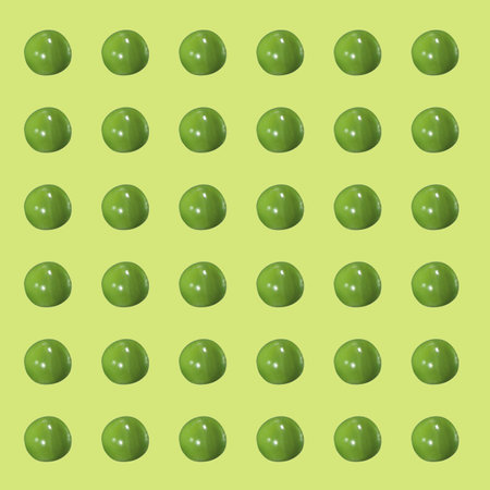 Background with green peas on a yellow background.の写真素材