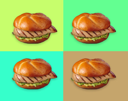 Bun with chicken and salad. Colored background.の写真素材
