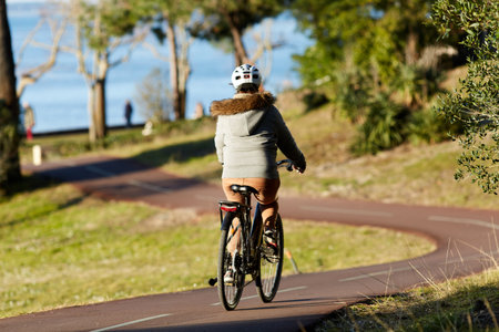 Person riding a bicycle on a cycle pathの写真素材