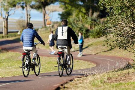 Person riding a bicycle on a cycle path