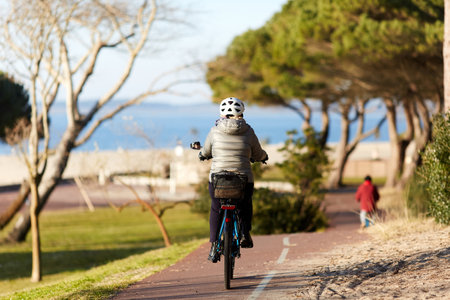 Person riding a bicycle on a cycle path