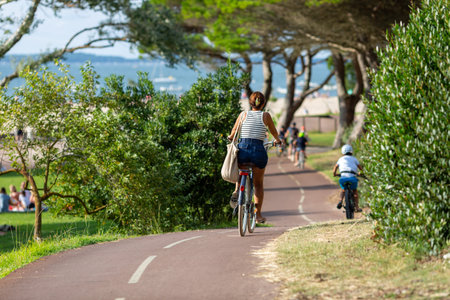 Person riding a bicycle on a cycle pathの写真素材