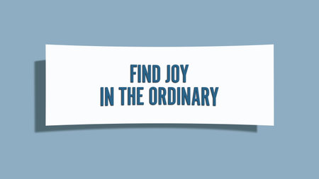Find joy in the ordinary. A card isolated on blue background.の写真素材