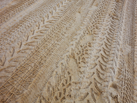 Tire track on sandy beach.の写真素材