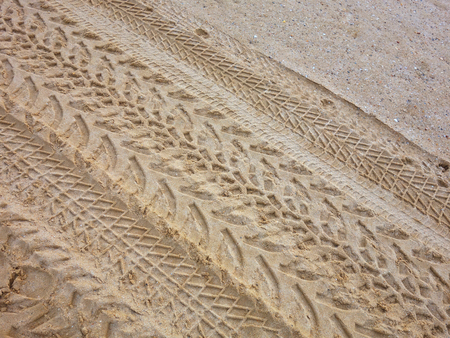 Tire track on sandy beach.の写真素材
