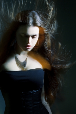 Beautiful lady with long brown hairの写真素材