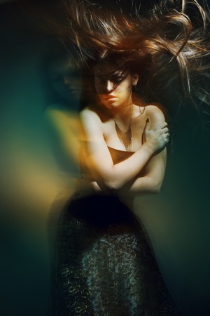 Beautiful lady with long brown hairの写真素材