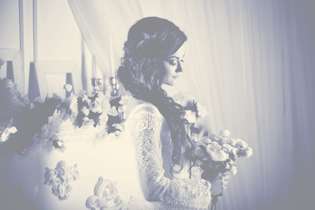 Photo of the bride in a wedding dress, monochrome toningの写真素材