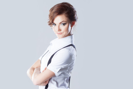 Successful business woman, in shirt on white backgroundの写真素材