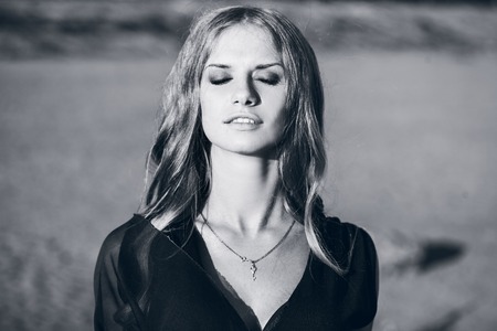 beautiful girl portrait with the effect of black and white toningの写真素材