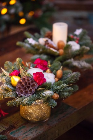 Fir branches decorated for the new year on dark wooden backgroundの写真素材