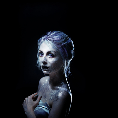 Bright fashion makeup, creative body art on the theme of space and stars.の写真素材