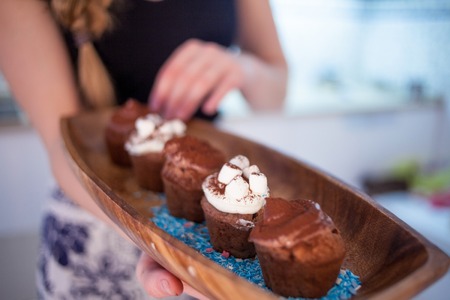 tasty birthday cupcake with candle on the table