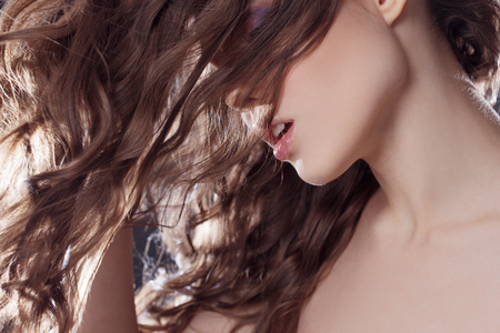 Beautiful Woman with curly Healthy Long Hairの写真素材