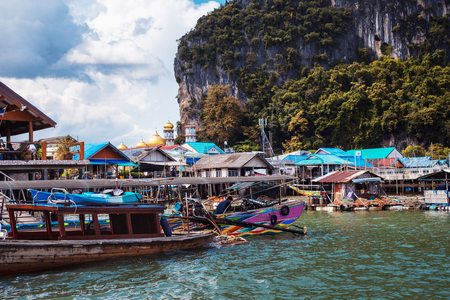 PHUKET, THAILAND, on 11 NOVEMBER, Long boat and rocks in the Gulf of Thailand the island of Phuket on November 11, 2014のeditorial素材