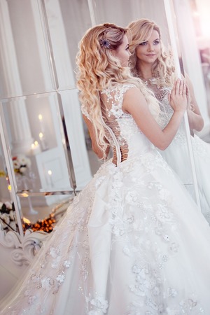 Beautiful girl bride in a magnificent dress.の写真素材