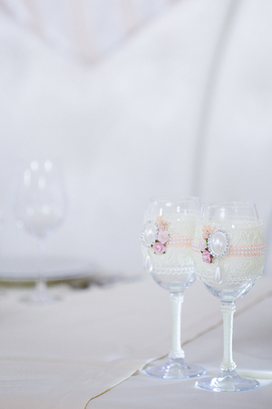 beautiful glasses of champagne and wine, wedding decor, celebrationの写真素材
