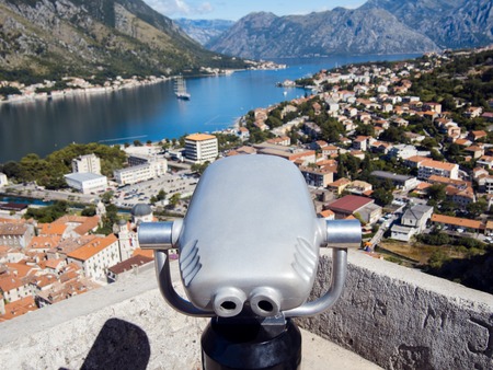 Coin Operated Binocular viewer to Bay of Kotor. Landscape with beautiful sea and mountainsの写真素材