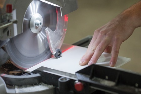 Circular Saw. Carpenter Using Circular Saw for metalの写真素材