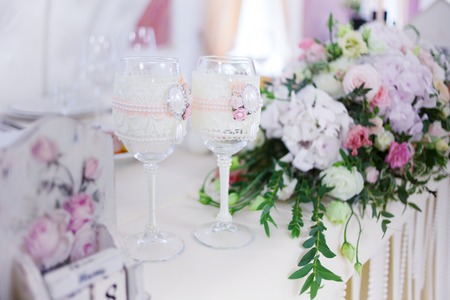 beautiful glasses of champagne and wine, wedding decor, celebrationの写真素材