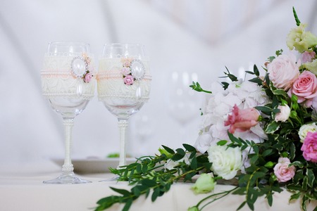 beautiful glasses of champagne and wine, wedding decor, celebrationの写真素材