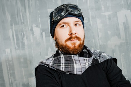 Retro Boy Pilot. The man in glasses and scarf, fantasy image of Aviator and visionaryの写真素材