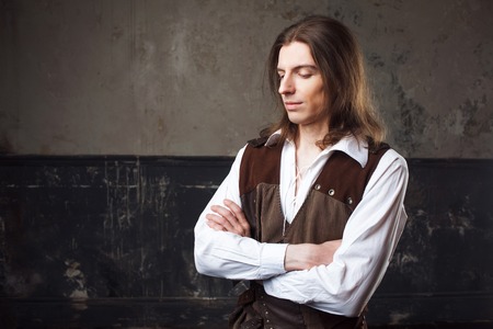 Retro man portrait over grunge background. Steam punk style.の写真素材
