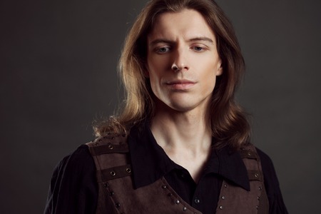 Retro man portrait over grunge background. Steam punk style.の写真素材