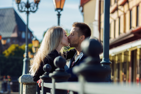 Kiss. Loving couple on a background of romantic old European cityの写真素材