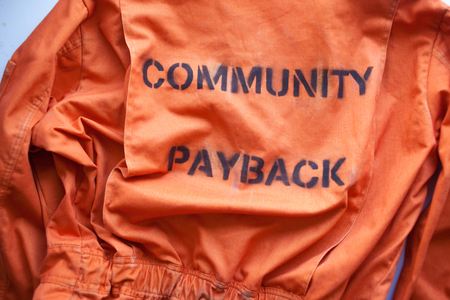 community payback. close up. Prison clothes, jumpsuit sentenced to correctional labor, criminal penaltiesの写真素材