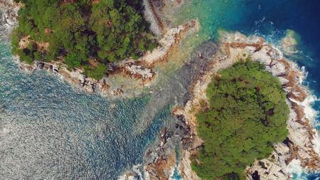 Gamova Peninsula and view of languishing heart island, Russia. Seaside landscape with coniferous...