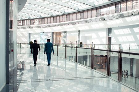 DUBAI, UNITED ARAB EMIRATES - APRIL 25, 2018: Dubai Mall, interior of the shopping center with shops and buyersのeditorial素材