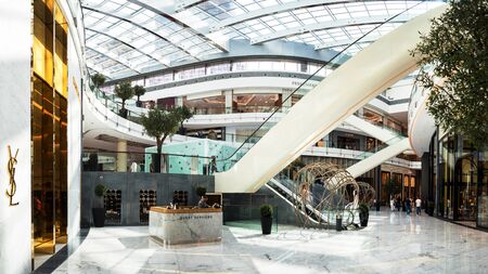 DUBAI, UNITED ARAB EMIRATES - APRIL 25, 2018: Dubai Mall, interior of the shopping center with shops and buyersのeditorial素材