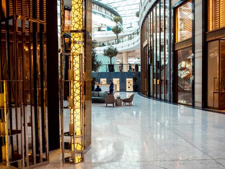 DUBAI, UNITED ARAB EMIRATES - APRIL 25, 2018: Dubai Mall, interior of the shopping center with shops and buyersのeditorial素材
