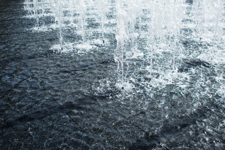 Water surface and fountain jets, the close-up