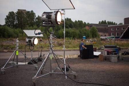 SAINT PETERSBURG, RUSSIA - OCTOBER 31, 2018: Film Crew On Location. 4K Camera Cinematographer. Filmmaking Set sceneryのeditorial素材