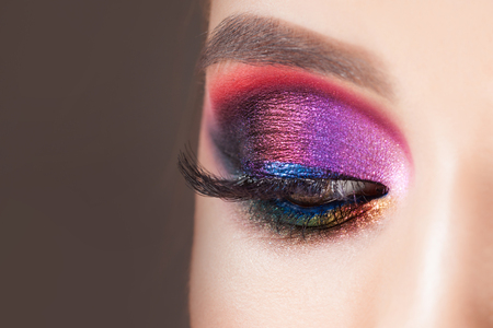 Amazing Bright eye makeup in luxurious blue shades. Pink and blue color, colored eyeshadow. Close upの写真素材